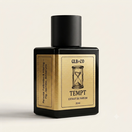 Tempt Pheromone Fragrance by GLB+CO, 30ml matte black bottle with a brushed gold label. Passion fruit, pineapple, and jasmine.