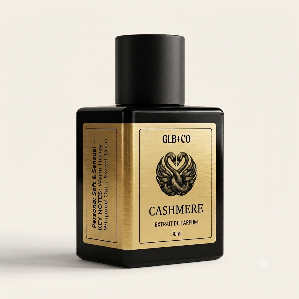 Cashmere Pheromone Fragrance by GLB+CO, 30ml matte black bottle with a brushed gold label. Warm honey, whipped oat, and sweet coco.
