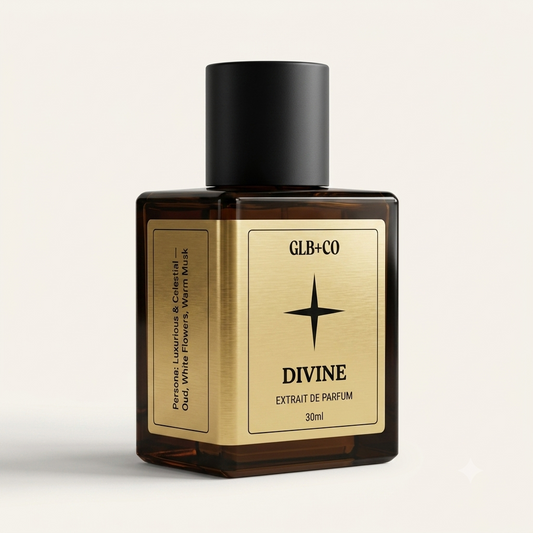 Divine Pheromone Fragrance by GLB+CO, 30ml matte black bottle with a brushed gold label. Oud, white flowers, and warm musk.
